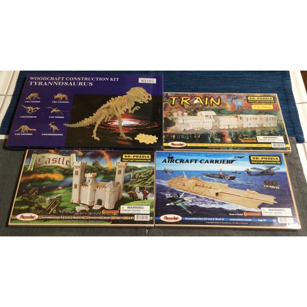 Lot of 4 Large Wood Puzzle 3D Kits Train Aircraft Carrier Castle Tyrannosaurus